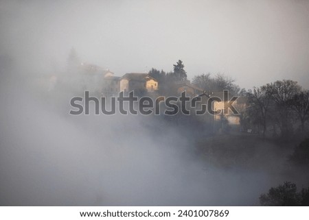 Foggy morning in the village of Monteriggioni