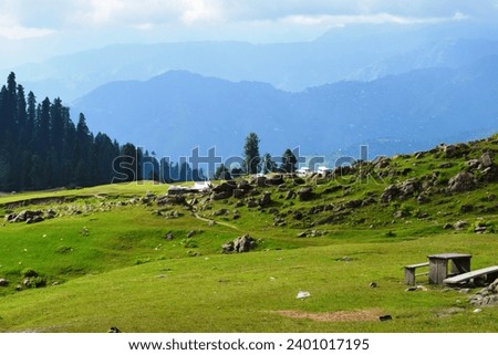 Lush green landscape of mountain top in Toli Peer, Azad Kashmir, Pakistan Royalty-Free Stock Photo #2401017195