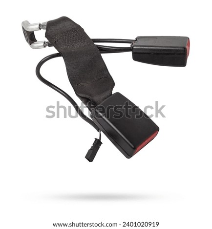 Two locks of a seat belt of a car of forward sitting with the panel for a fastening bolt a plastic case of black color with red unlock keys. Spare part for replacement during repair or sale.