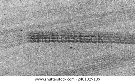 Aerial top view car tire marks burnout, Tire marks on the asphalt road, Tire mark on race track texture and background.