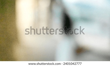 Royalty high quality free stock photo of abstract blur and defocused unidentified girl wearing Vietnamese traditional ao dai