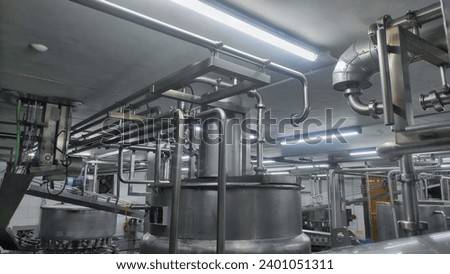 Stainless stainless pipe to flow water and product and tank in production room of factory