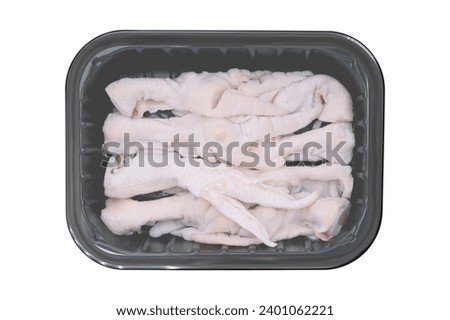 Boneless chicken feet packaged in black trays