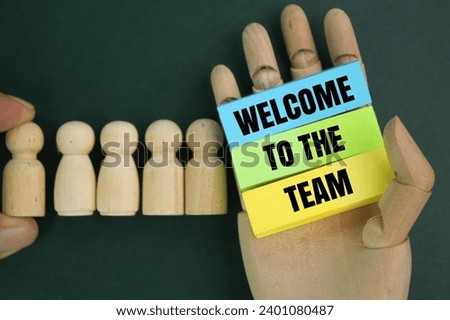 colored paper with alphabet letter words welcome to the team. the concept of hiring new employees. teamwork concept Royalty-Free Stock Photo #2401080487