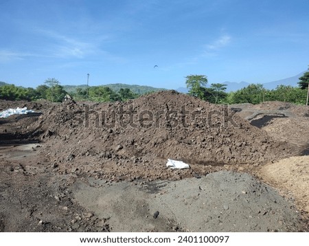 Piles of waste ash from the sugar factory