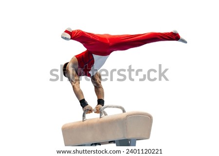 male gymnast performing on pommel horse competition artistic gymnastics isolated on white background Royalty-Free Stock Photo #2401120221