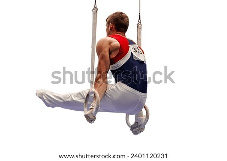 male gymnast exercise l-sit position on ring frame in artistic gymnastics isolated on white background, summer sports games Royalty-Free Stock Photo #2401120231