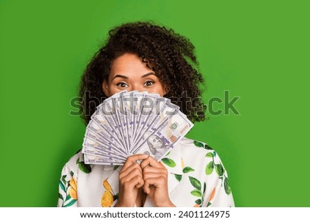Photo of funky tricky lady wear print shirt money fan cover face empty space isolated green color background