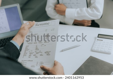 Coverage of a new employee interview, an employer checking a good CV of a candidate with prepared skills, a candidate reviewing an application, a work