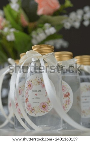 Zamzam water gifts and Giveaways are prepared for one of the occasions and personalized with the customer’s name so that they remain an everlasting memory as wedding giveaways  Royalty-Free Stock Photo #2401163139