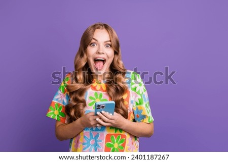 Photo of crazy girl open mouth scream when see minus 90 percent price off her favorite brand in phone isolated on purple color background