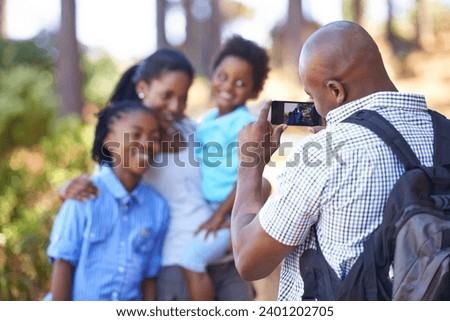 Happy black family, photography and nature for hiking, bonding or outdoor photo together. African mother, children and father or photographer smile taking picture on phone for adventure in forest