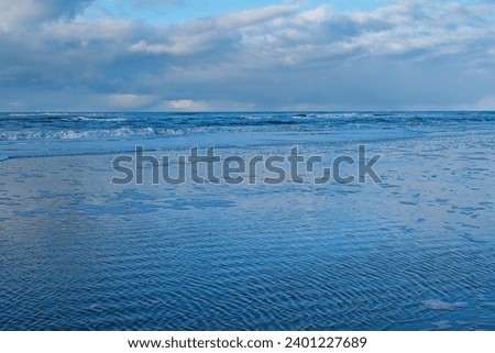 View over the North Sea with a sandy beach