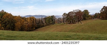 Beautiful Autumn Countryside in the Foothills of the Appalachian Mountains Royalty-Free Stock Photo #2401235397