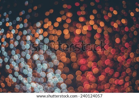 Colorful bokeh lights from Christmas and New Year decoration with fade filter applied 