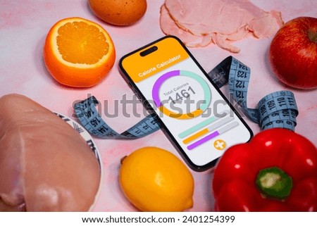 Calorie counting using a smartphone application. Healthy diet and weight loss. Royalty-Free Stock Photo #2401254399