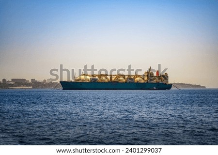 Large LNG carrier ship in sea. Liquefied gas tanker in the Atlantic Ocean near Dakar, Senegal, Africa. Royalty-Free Stock Photo #2401299037