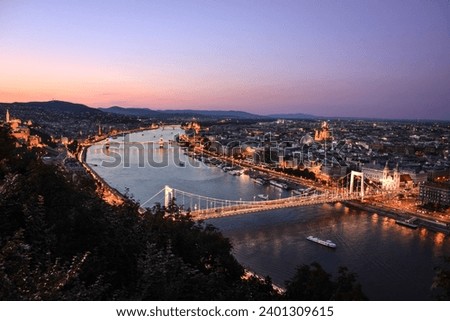 The Danube River and Budapest Cityscape Seen from the Citadella at Dusk - Hungary Royalty-Free Stock Photo #2401309615