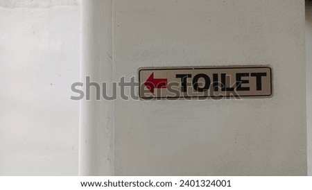 Toilet sign in a public facility or hotel

