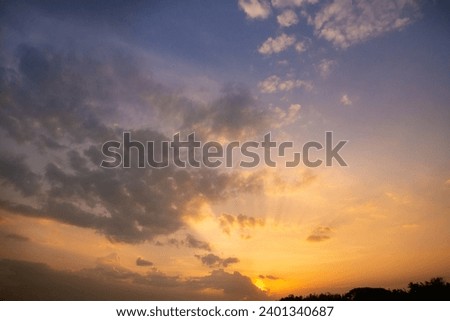 full sky with blue color along with clouds, Full sky in yellow color with rising of sun, Combination of blue and yellow sky Royalty-Free Stock Photo #2401340687