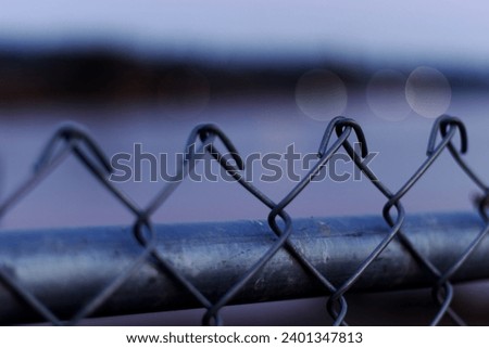 Close up of chain link fence Royalty-Free Stock Photo #2401347813