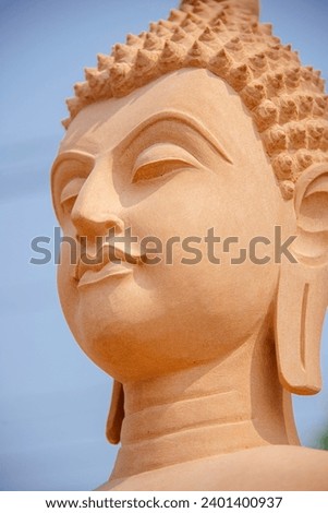 Buddha statue carved from sandstone, Thailand