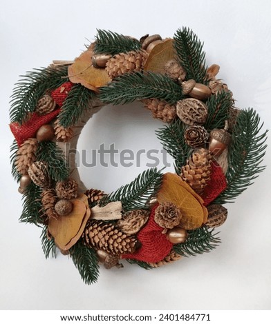 Christmas Wreath of pine branches, cones, leaves, beads and snowflakes. Holiday Decoration Gift For family and friends. New Year's home wall decor different angles handmade top view, side view	