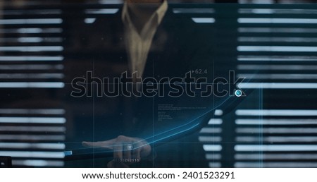 Businessman drawing an ascending financial chart. Touchscreen display showing financial downward trend. Finance and money technology. Financial diagrams appearing.