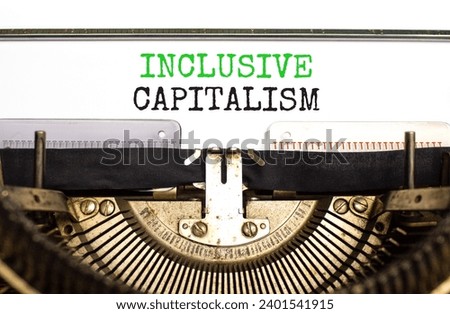 Inclusive capitalism symbol. Concept words Inclusive capitalism typed on beautiful old retro typewriter. Beautiful white paper background. Business inclusive capitalism concept. Copy space.