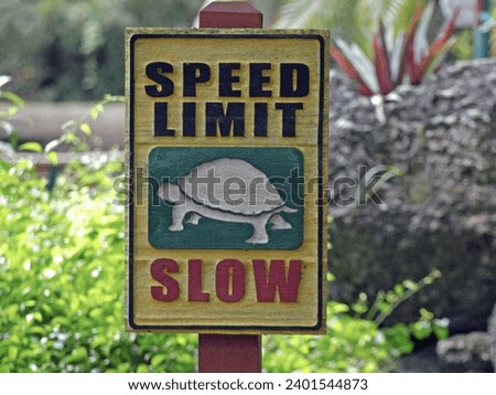 Funny sign for slow speed limit in the Miami zoo. 