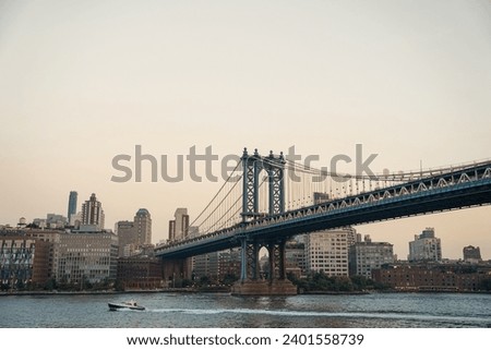 Manhattan Bride and Brooklyn view in summer during Golden Hour w