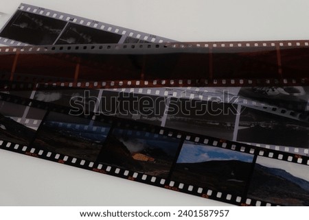35mm slide film for photo or film with free frame copy space, isolated on white background, close up