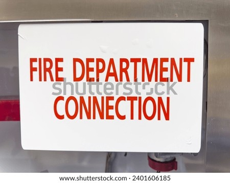 fire department sign against a clear sky, symbolizing safety and emergency preparedness