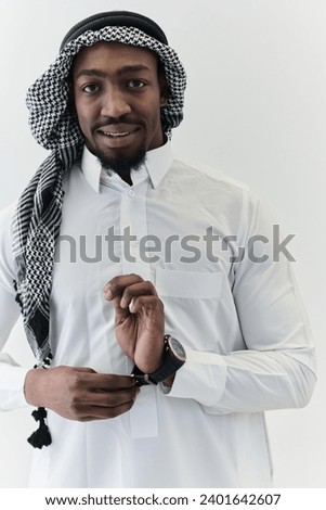 Arabic entrepreneur captures a self-portrait against an isolated white background, radiating ambition, determination, and corporate charisma, embodying the essence of a successful and influential