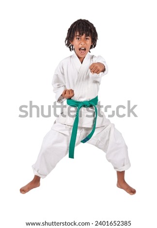 african american boy in karate suit training, mixed race , uniform karate gi , keikogi or dogi, suit is white, he is mixed race with braids, dreadlocks, isolated on white background Royalty-Free Stock Photo #2401652385