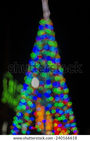 Abstract circular bokeh backgroundand Bokeh colour abstract background of Happy new year 2015 and tree Christmaslight on dark night