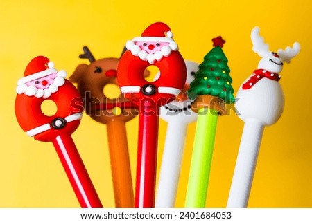 Christmas themed decorate isolated on yellow background.Christmas concept.