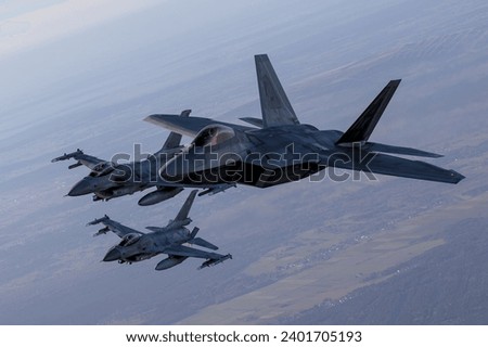 US Air Force F-22 RAPTOR fighter jets overhead Poland Royalty-Free Stock Photo #2401705193