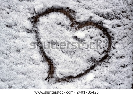 Romantic depiction of a heart as a token of love on a tree
