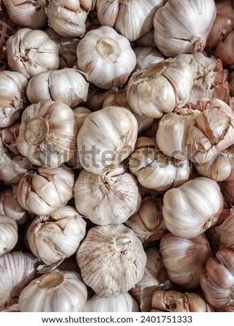 Close up large pile of Garlic
Organic garlic top view. 
Food background. 
Selective focus.