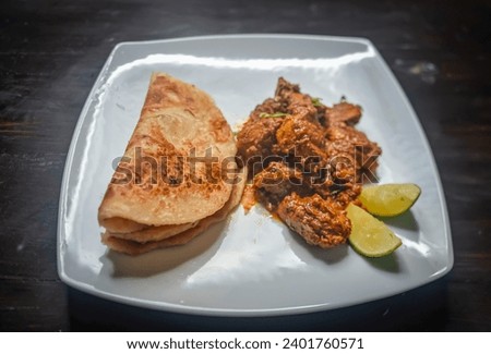 Chicken masala with Paratha, Spicy Tikka Masala, Chicken Curry 1