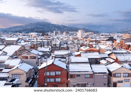 Wajima, Ishikawa, Japan town skyline in winter at twilight. Royalty-Free Stock Photo #2401768683