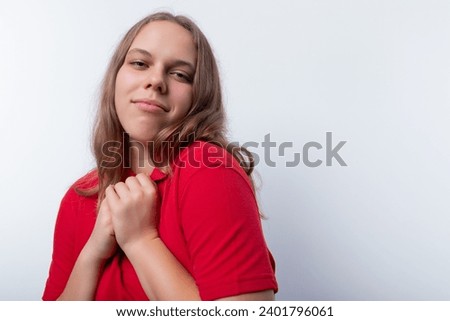 Dreamy teenager girl thinking on a white background