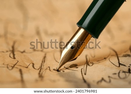 Writing letter with beautiful fountain pen, closeup Royalty-Free Stock Photo #2401796981