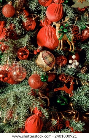 Beautiful and decorated Christmas tree. New Year mood. Holidays background for greeting cards.
