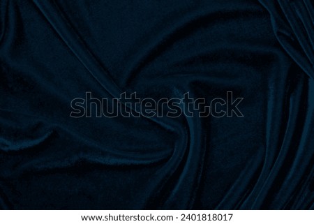 light blue corduroy fabric texture used as background. color blue fabric background of soft and smooth textile material. cloth, velvet, grooves luxury navy tone for silk.	