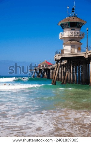 Surf Day at the Huntington Beach Pier Royalty-Free Stock Photo #2401839305
