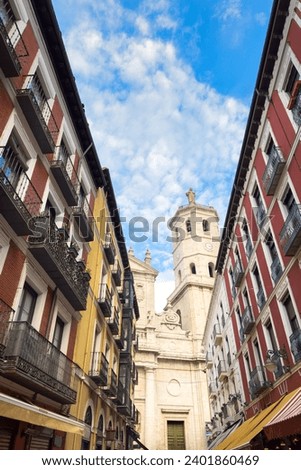 City center of Valladolid with beautiful architecture style and colourful buildings. Cathedral tower in background. High quality photography
