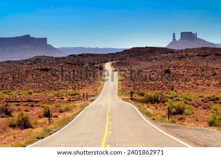 Traveling the South-West on Utah State Route 128 from Cisco to Moab along the Colorado River, Utah, USA Royalty-Free Stock Photo #2401862971