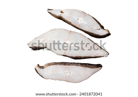 Sliced halibut fish, raw steaks on plate with thyme. Isolated on white background